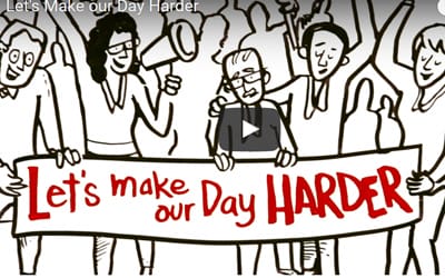 A cartoon drawing of a diverse group of people holding a banner that reads "let's make our day harder," with one person using a megaphone.