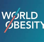 Logo of "World Obesity," featuring text with a blue and red diagonal line cutting through the letter 'O' against a teal background.